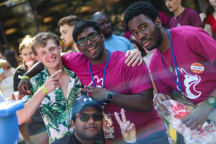 Students smiling in group photo at Welcome Weeks