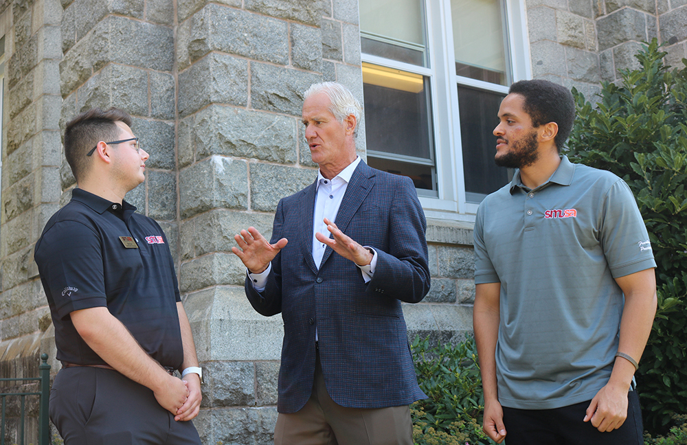 Scott chatting with SMUSA VP Advocacy Kyle Cook and SMUSA President and CEO Franklyn Southwell