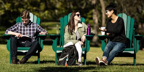 Students on Campus sitting outside