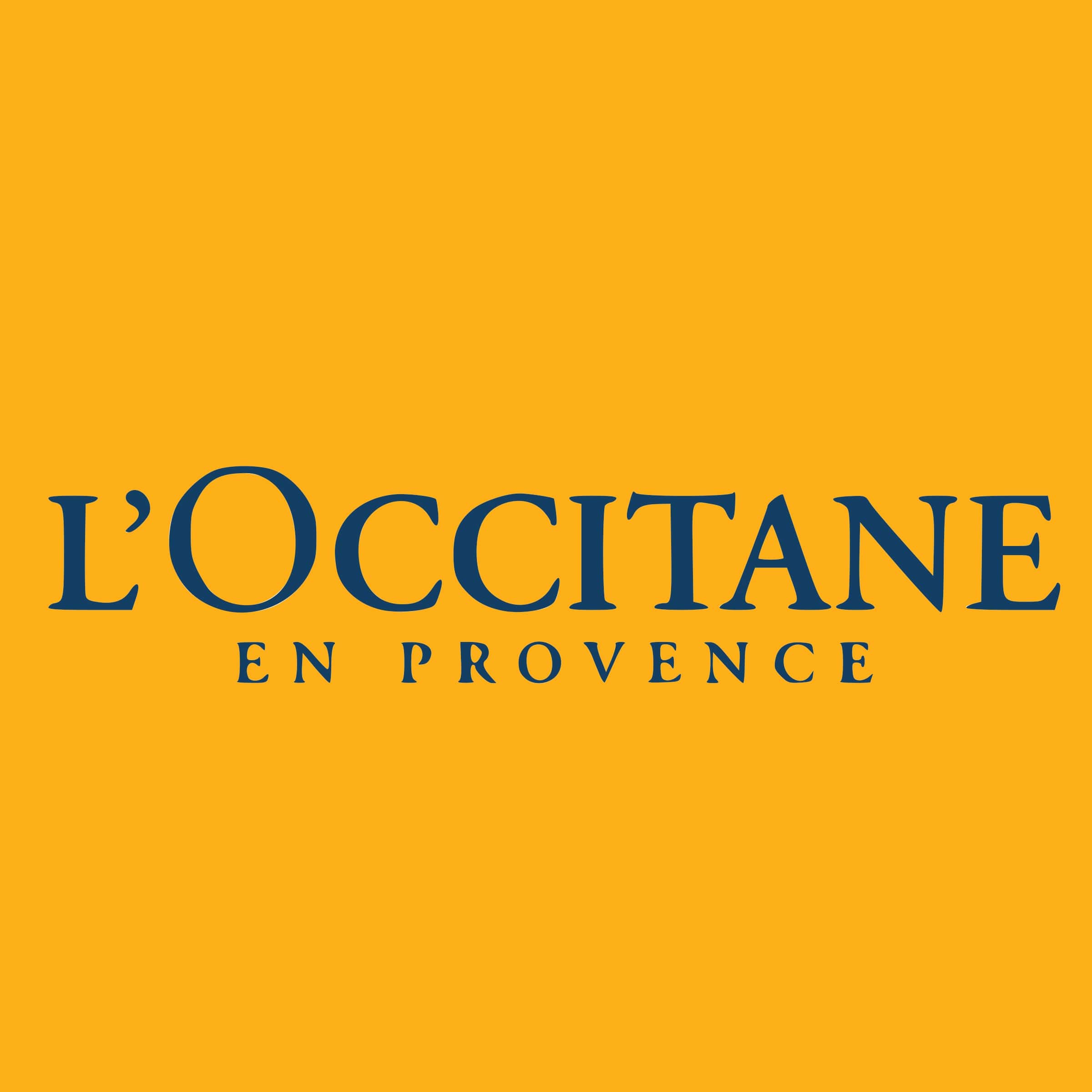 The text L'Occitane on a yellow background