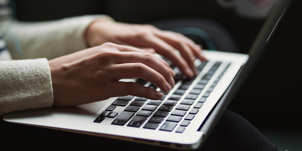 Hands at keyboard